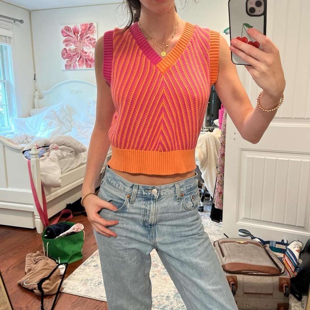 Pink and orange sweater vest